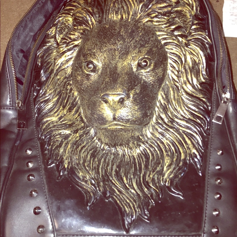 Lion leather studded back pack. Absolutely unreal